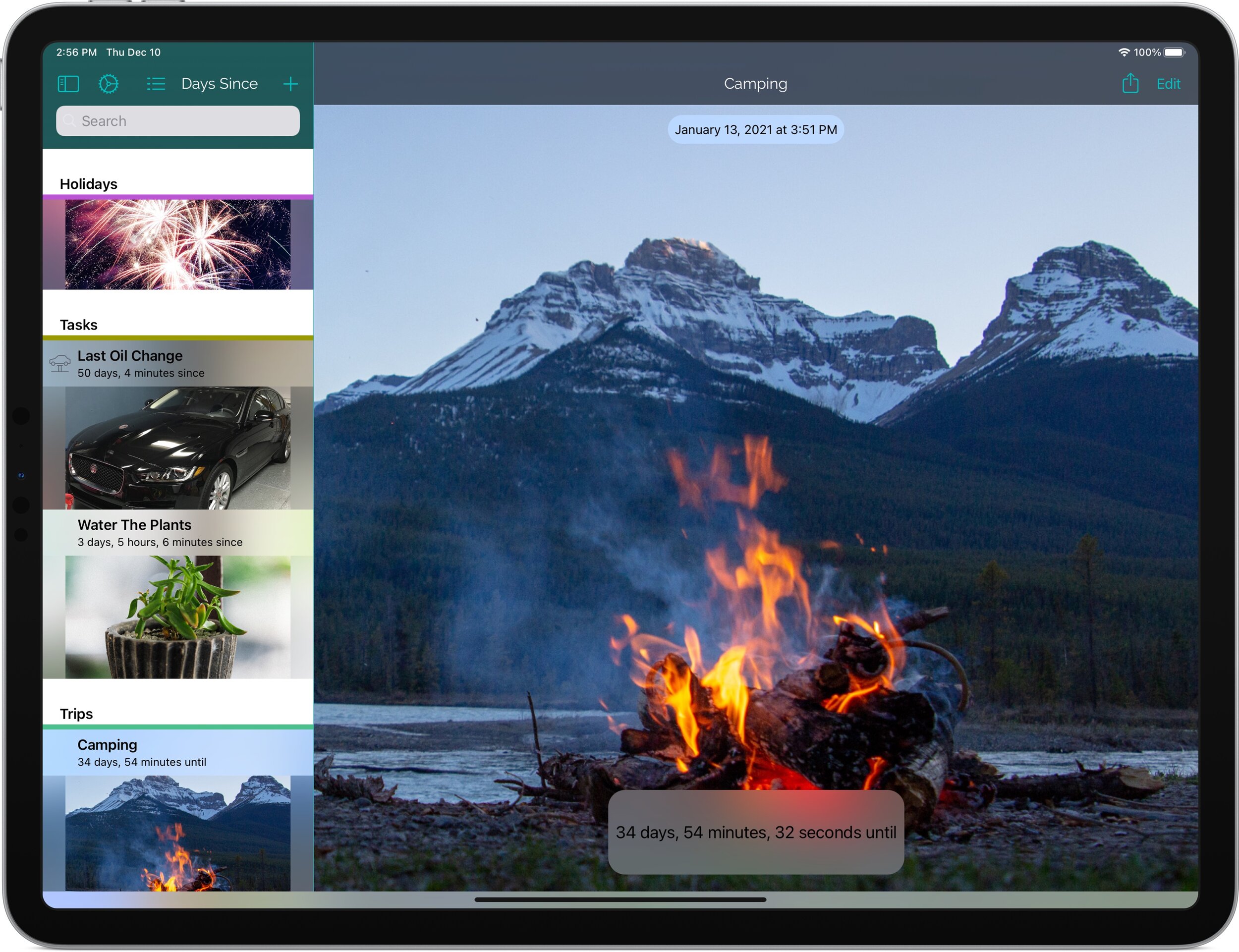 A camping countdown on iPad with a custom campfire photo background
